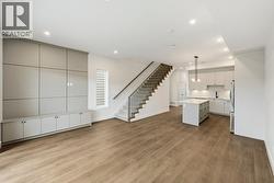 Living/dining room space with built-in media wall - 
