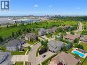 Aerial perspective showcasing a residential community with varied architectural styles - 38 River Valley Drive, Kitchener, ON 