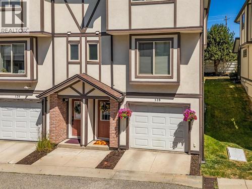 End unit so only 1 common wall and the garage is 1' wider than many in the complex. - 128-1651 Lynrick Road, Kelowna, BC 