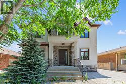 67 MCADAM AVENUE Toronto, ON M6A 1S6