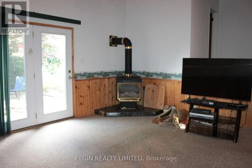 family room with gas fireplace - 44356 Talbot Line, Central Elgin, ON 