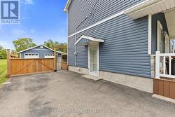 Side separate entrance to lower level unit - 