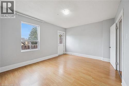 with walk-out to private balcony - 126 Wellington Street N, Kitchener, ON - Indoor Photo Showing Other Room
