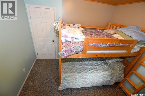 134 Sunridge Road, Pebble Baye, SK - Indoor Photo Showing Bedroom