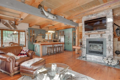 Vue d'ensemble - 128 Ch. Du Geai-Bleu, Duhamel, QC - Indoor Photo Showing Living Room With Fireplace