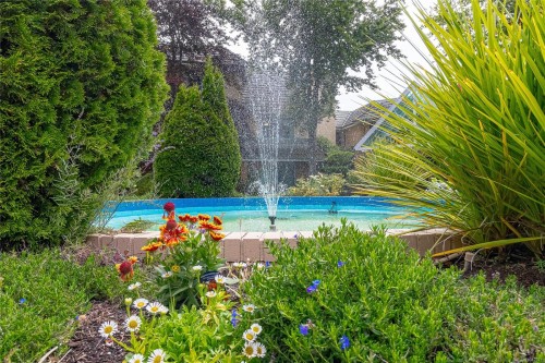 #302-2311 Mills Rd, Sidney, BC - Outdoor With In Ground Pool
