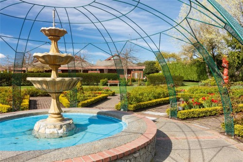 #302-2311 Mills Rd, Sidney, BC - Outdoor With In Ground Pool With Backyard