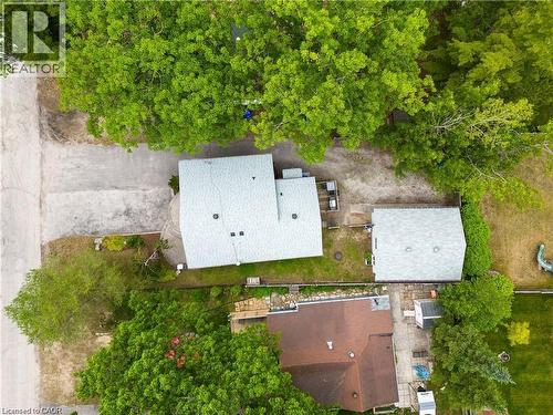 Property featuring two structures with light gray shingled roofs - 42 5Th Lane, Wasaga Beach, ON - Outdoor
