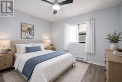 Virtually staged 2nd bedroom. - 