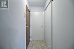 Foyer with a large closet and storage space. - 