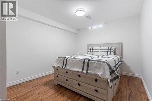 Bedroom with light wood-style floors and baseboards - 1118 Avondale Drive, Oakville, ON 