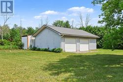separate detached garage at back of property. - 