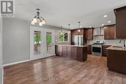Garden doors lead onto the large covered deck. - 