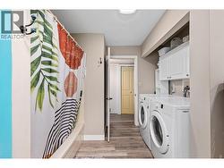 Convenient large bathroom with laundry. - 