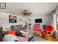 Living Room with a picture window overseeing the beautiful views. - 
