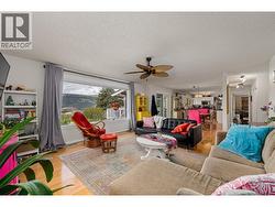 Open concept living, dining and kitchen, great for entertaining. - 