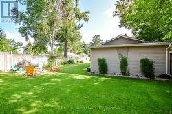Expansive lawn is exceptionally well maintained - 