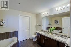 Double vanity with granite countertop and dual undermount sinks - 