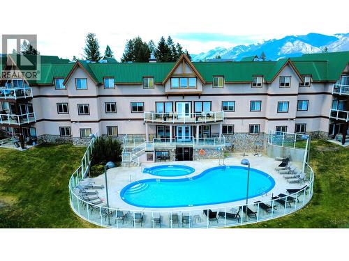 701 14A Crescent Unit# 213 I, Invermere, BC - Outdoor With In Ground Pool