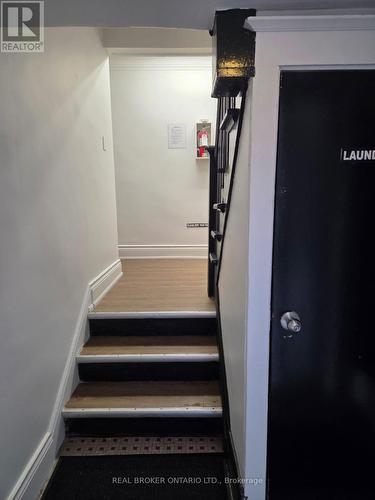 Laundry is located in the basement of the building - 6 - 983 Main Street E, Hamilton, ON 