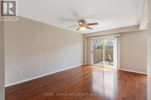 Living Room with sliding door to rear patio/yard - 81 - 286 Cushman Road, St. Catharines (Carlton/Bunting), ON 