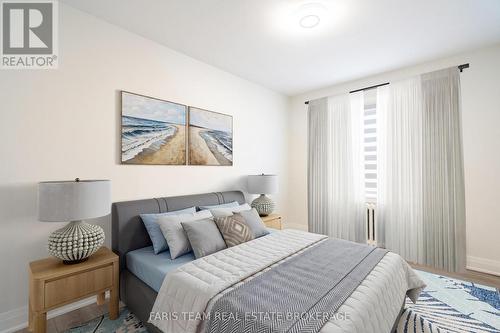 Virtually Staged - 267 Lakeshore Road E, Mississauga, ON 