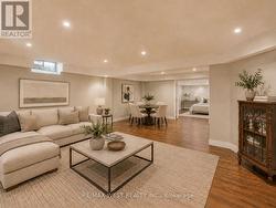 Basement Media Room - Photo virtually staged - 