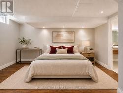Basement Bedroom - Photo virtually staged - 
