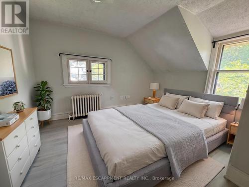 Virtually Staged - 62 Plains Road E, Burlington, ON 