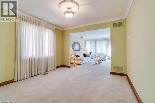 Combined dining/living room, broadloom. - 2560 Rugby Road, Mississauga, ON 