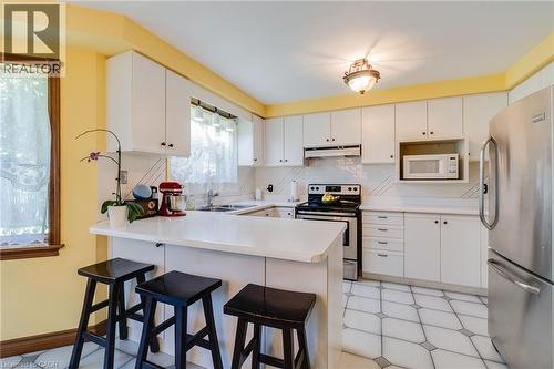 Ceramic flooring, breakfast bar, double sink - 2560 Rugby Road, Mississauga, ON 