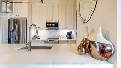 Under cabinet lighting & herringbone black splash - 