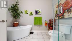 Deep free-standing soaker tub in ensuite - 
