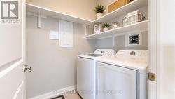 In-suite laundry with shelving - 