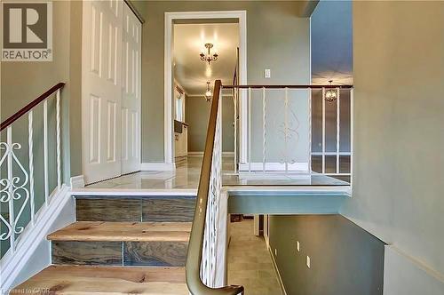 Split-level entry with wood-finish stair treads and tiled risers - 599 Upper Horning Road Unit# Main/Upper, Hamilton, ON 