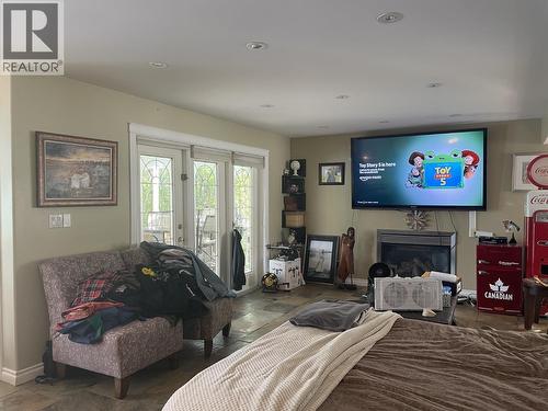 5524 Minnaker Crescent, Fort Nelson, BC - Indoor Photo Showing Living Room With Fireplace