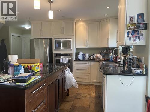 5524 Minnaker Crescent, Fort Nelson, BC - Indoor Photo Showing Kitchen
