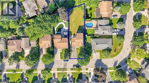 Expansive property with a substantial undeveloped lot, mature trees, and a curvilinear street layout - 127 Acorn Crescent, London, ON 