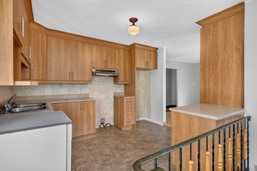 Kitchen - 988 18E Avenue, Laval (Fabreville), QC - Indoor Photo Showing Kitchen With Double Sink