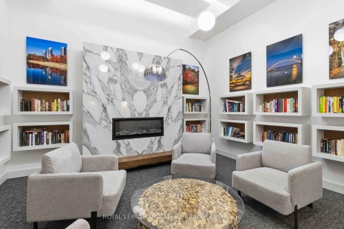 1812-185 Legion Road N, Toronto, ON - Indoor Photo Showing Living Room With Fireplace