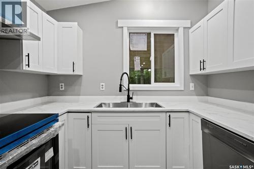 2905 Grant Road, Regina, SK - Indoor Photo Showing Kitchen With Double Sink