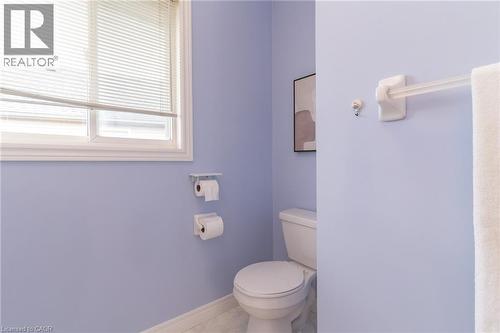 White toilet with a white seat - 566 Avignon Place, Waterloo, ON 