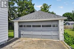 OVERSIZED 1.5 garage, with large workshed. - 