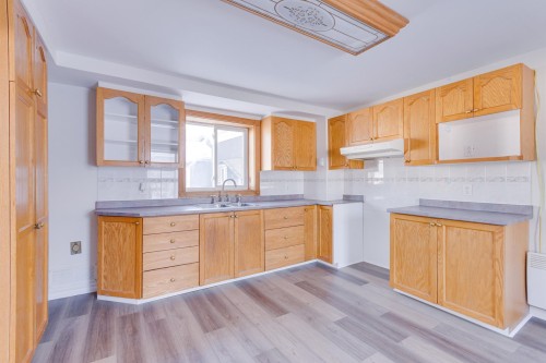 Cuisine - 18 Ch. Du Pont, Val-Des-Monts, QC - Indoor Photo Showing Kitchen With Double Sink