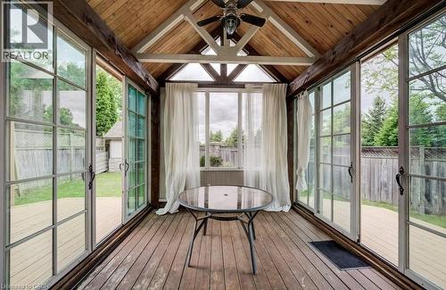 Vaulted wood-paneled ceiling with exposed beams and central ceiling fan - 123 Forest Edge Trail, Kitchener, ON -  With Exterior