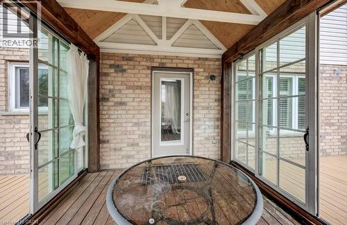 Covered outdoor patio with wood-finish flooring and exposed beam ceiling - 123 Forest Edge Trail, Kitchener, ON -  With Exterior