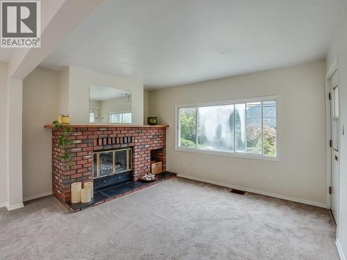720 Third Street, Nelson, BC - Indoor Photo Showing Living Room With Fireplace