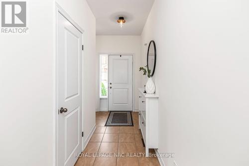 Inviting front foyer with closet and garage access - 22 - 45 Seabreeze Crescent, Hamilton, ON 