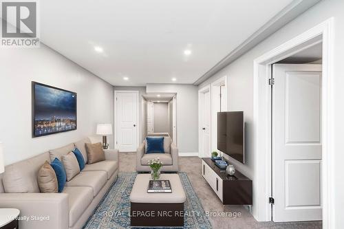 Virtually staged family room - 22 - 45 Seabreeze Crescent, Hamilton, ON 