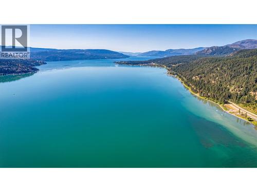 Your opportunity to enjoy summers at the lake. - 1 Imtil Road, Vernon, BC - Outdoor With Body Of Water With View